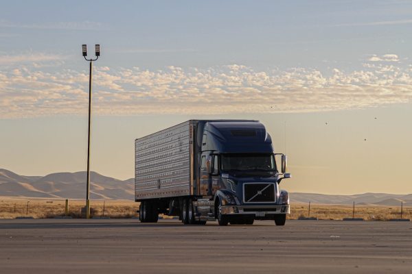 black truck on road during daytime